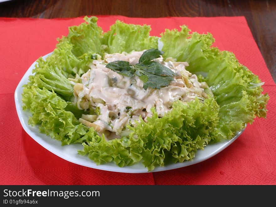 Meat salad served with sause