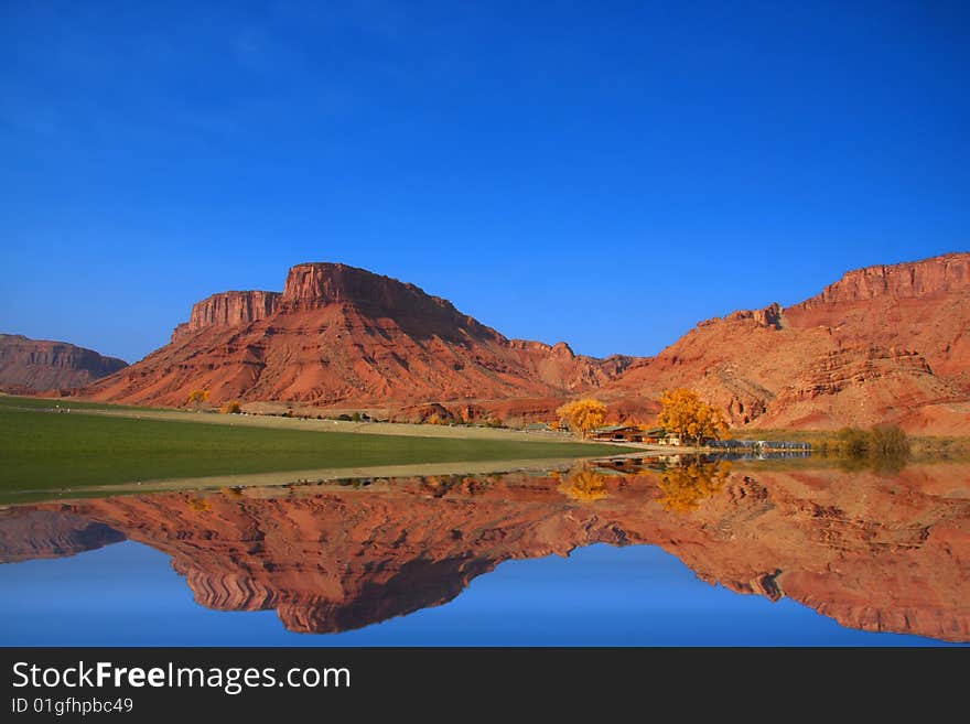 Farm in the red rock country with reflections. Farm in the red rock country with reflections