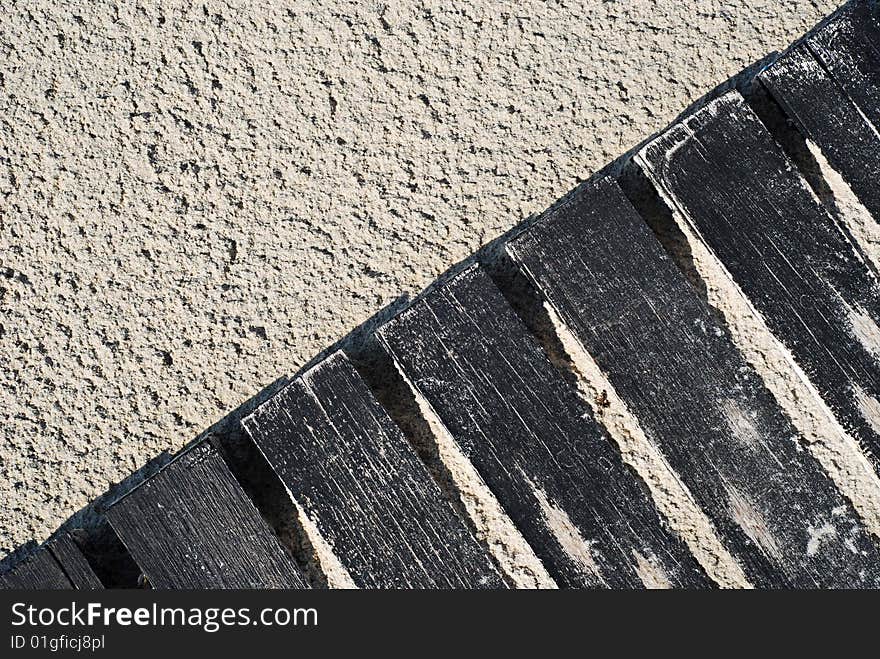 Wooden floor and sand for use as background