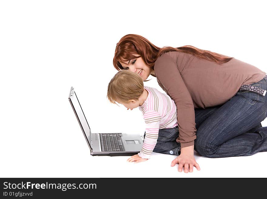 Mother and daughter playing on laptop. Mother and daughter playing on laptop