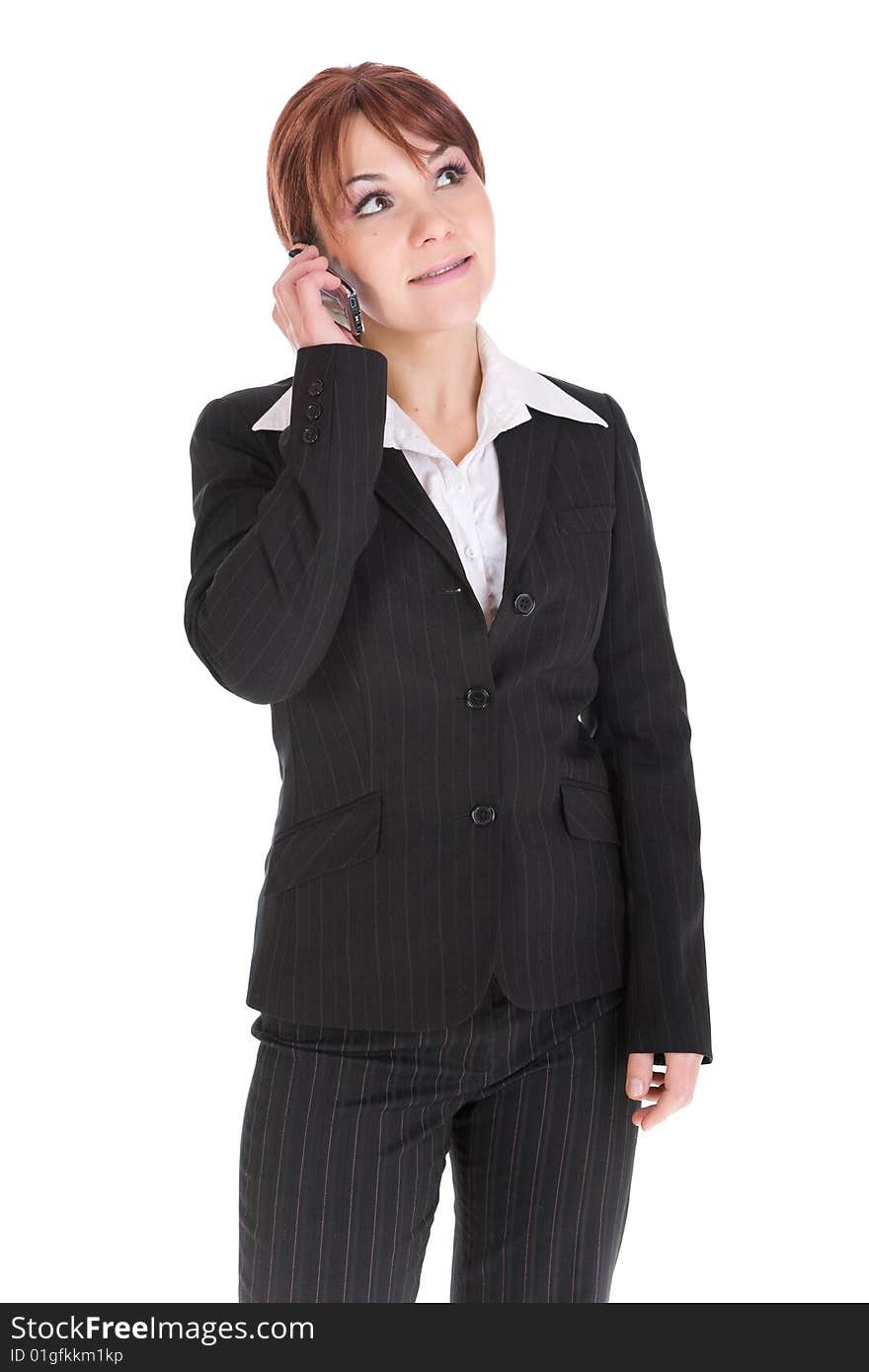 Attractive businesswoman with mobile phone. over white background