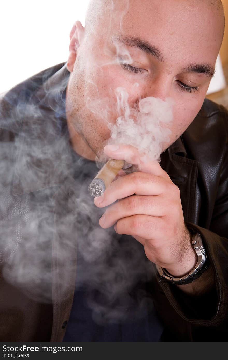 Danger man smoking cigar. over white background. Danger man smoking cigar. over white background