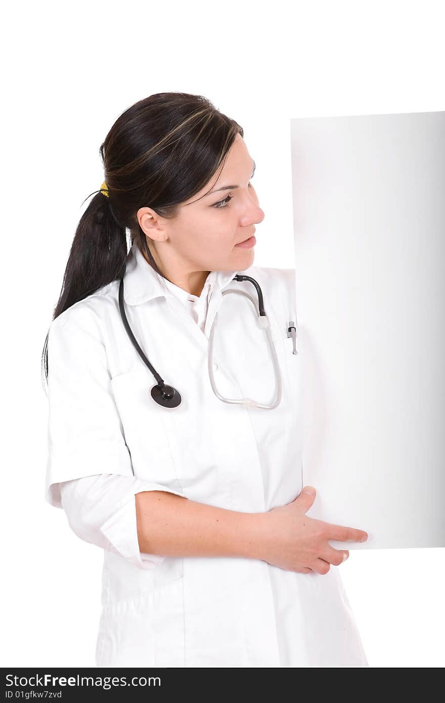 Attractive female doctor with board. over white background