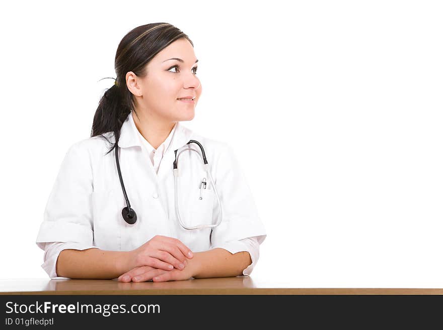 Attractive brunette doctor . over white background. Attractive brunette doctor . over white background