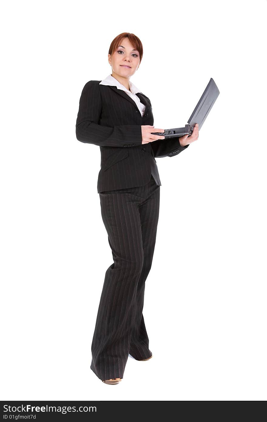 Attractive businesswoman with laptop. over white background