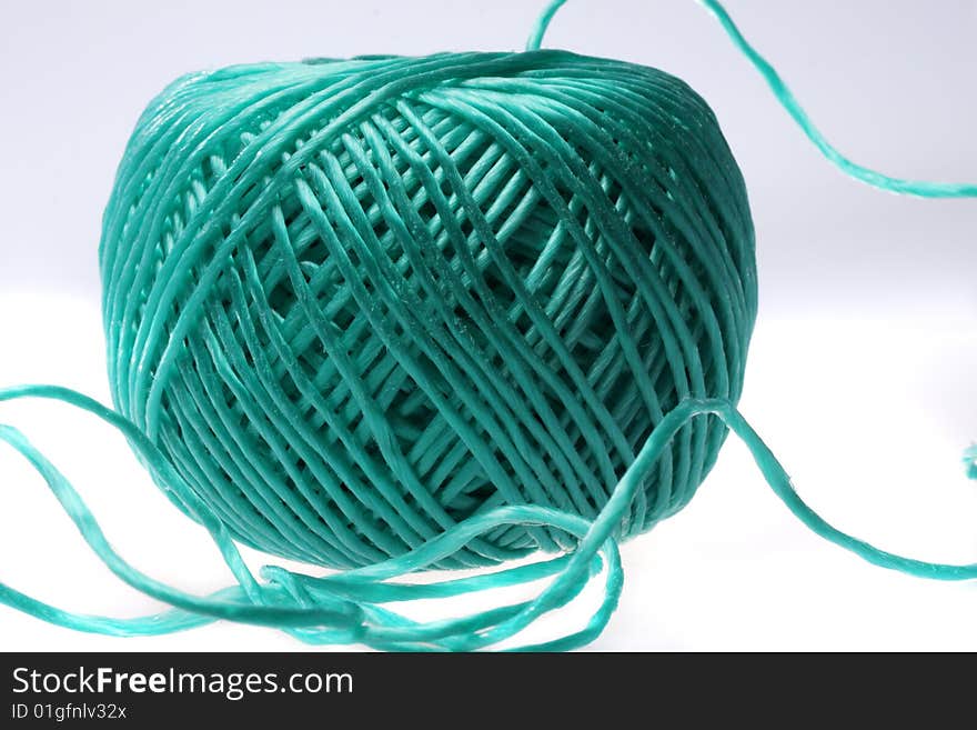 Close up from a green ball of rope. Close up from a green ball of rope