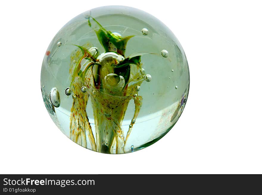 Green glass sphere with artifacts inside