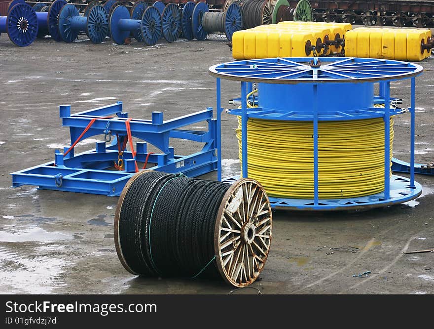 Wire drums on the quayside. Wire drums on the quayside