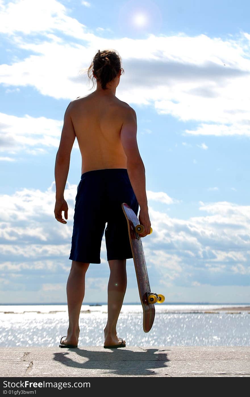 Young man with skate board