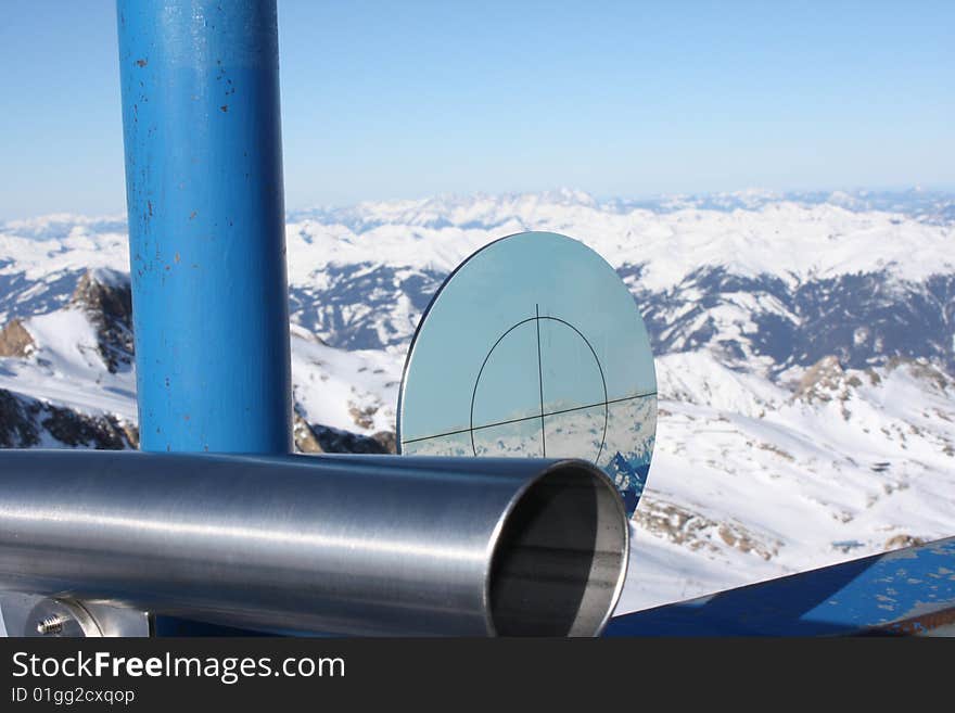 Austria. Mountains. The Alpes.Snow. The sun. Mountain tops.