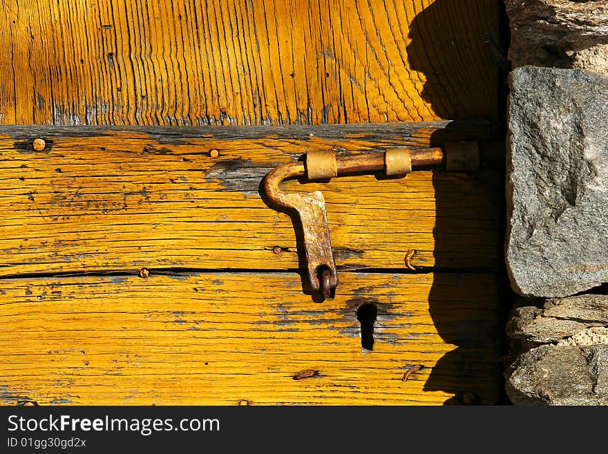 Locking of an old wooden door. Locking of an old wooden door