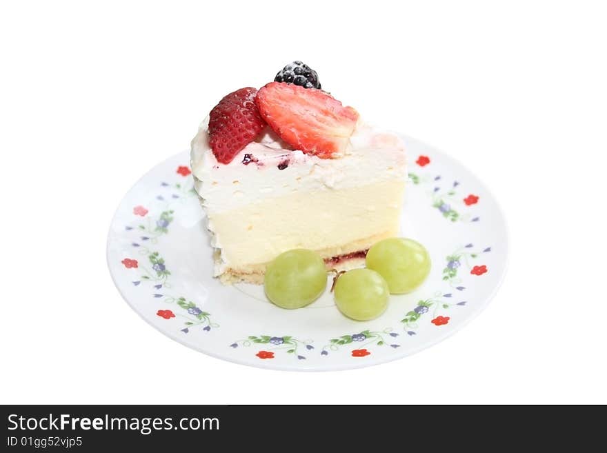 Isolated cake on the colorful plate