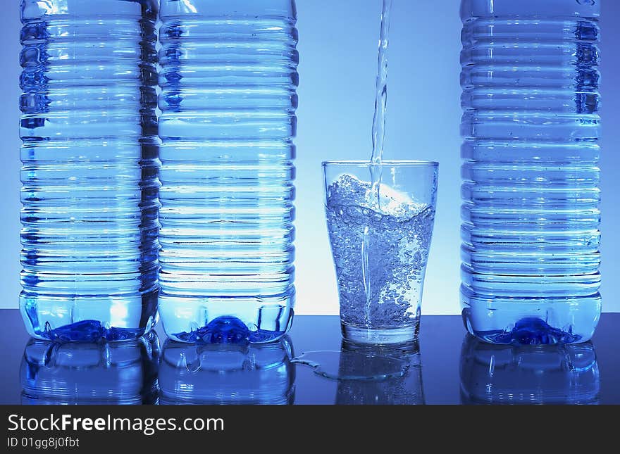 Water is poured into a glass