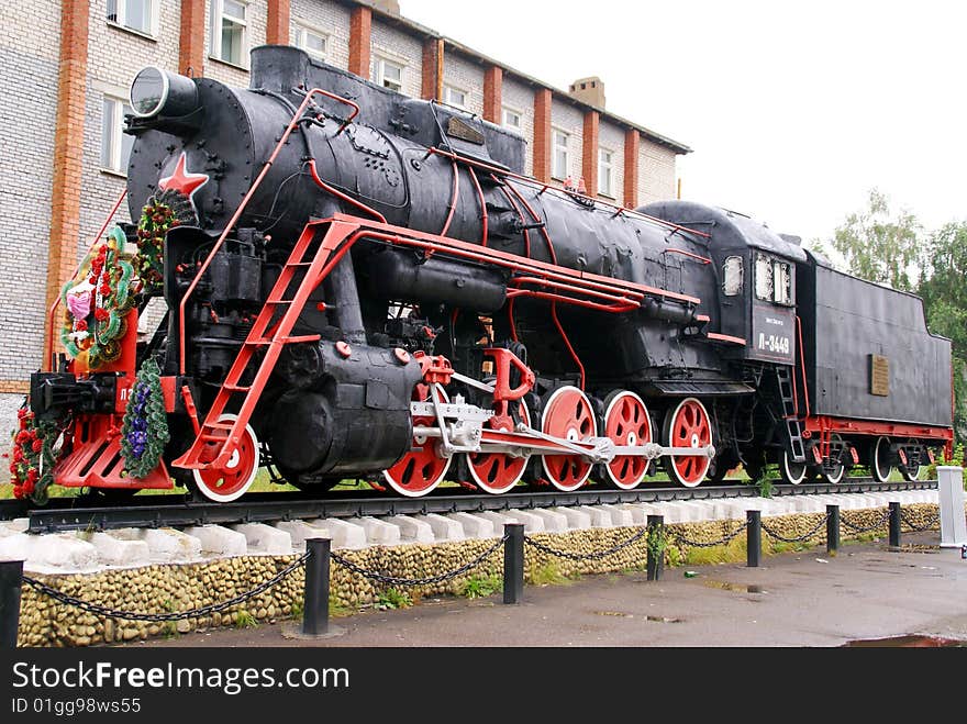 Steam locomotive standing like monument