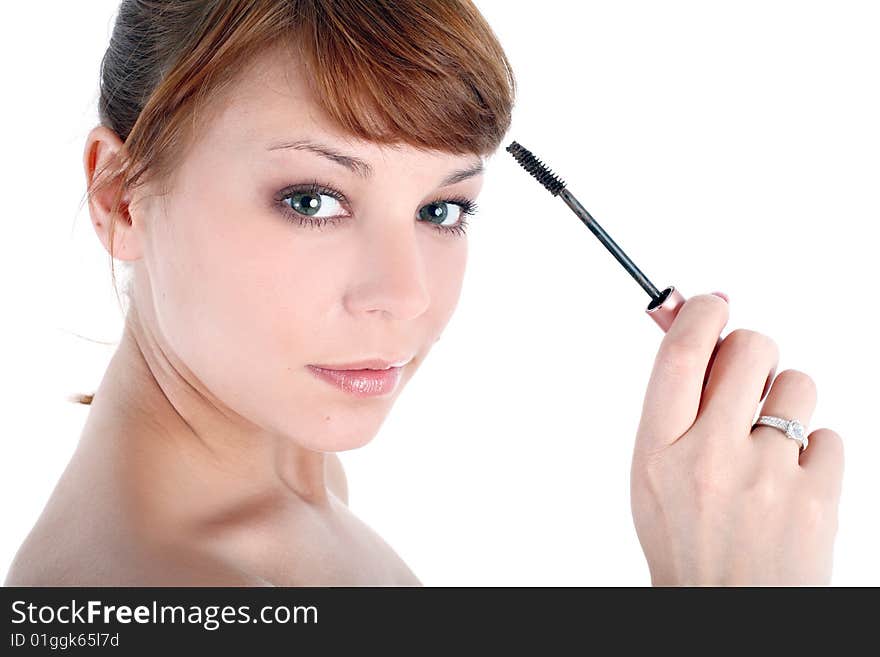 20s girl with liquid mascara isolated on white. 20s girl with liquid mascara isolated on white