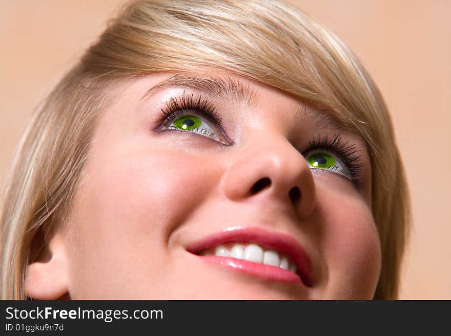 Pretty girl with green eyes - close-up face portrait