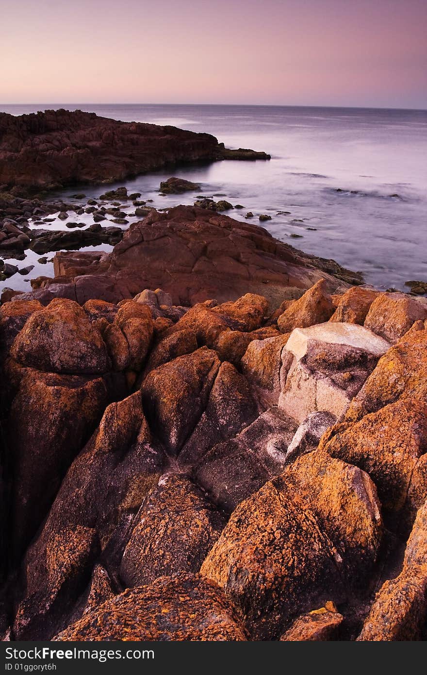 Beautiful ocean cove taken in Anna Bay, NSW, Australia during twilight conditions. Beautiful ocean cove taken in Anna Bay, NSW, Australia during twilight conditions.