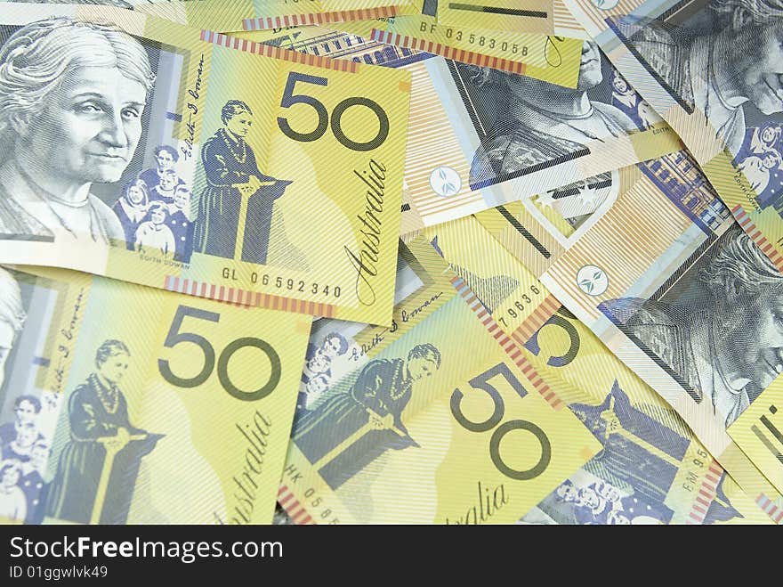 Australian fifty dollar notes spread randomly