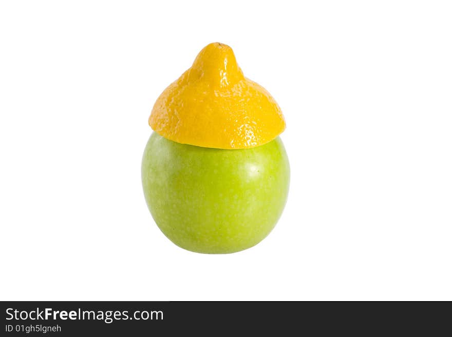 Green fresh apple in a yellow hat from a lemon. Green fresh apple in a yellow hat from a lemon