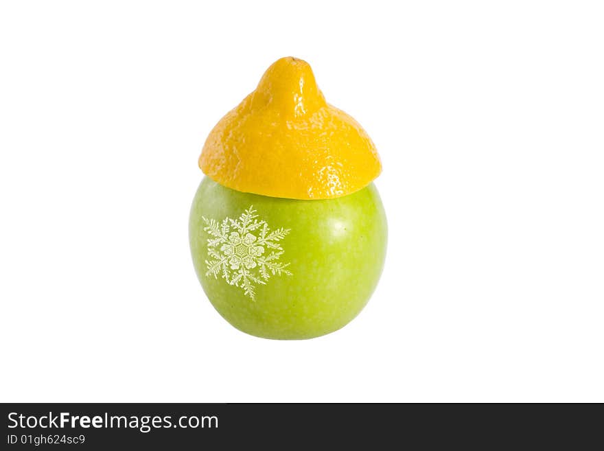 Green apple with a snowflake in a yellow hat