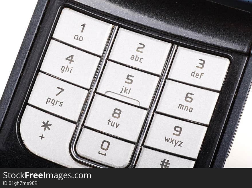 Close up of silver mobile phone keyboard. Close up of silver mobile phone keyboard.