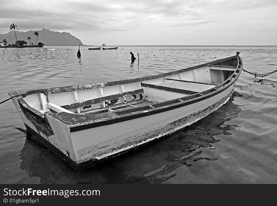 This is a black and white picture of a harbor on Kaneohe Bay, Hawaii. This is a black and white picture of a harbor on Kaneohe Bay, Hawaii.