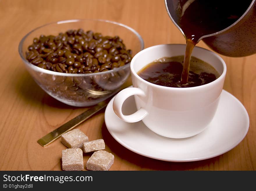 Cup Of Coffee, Sugar And Beans