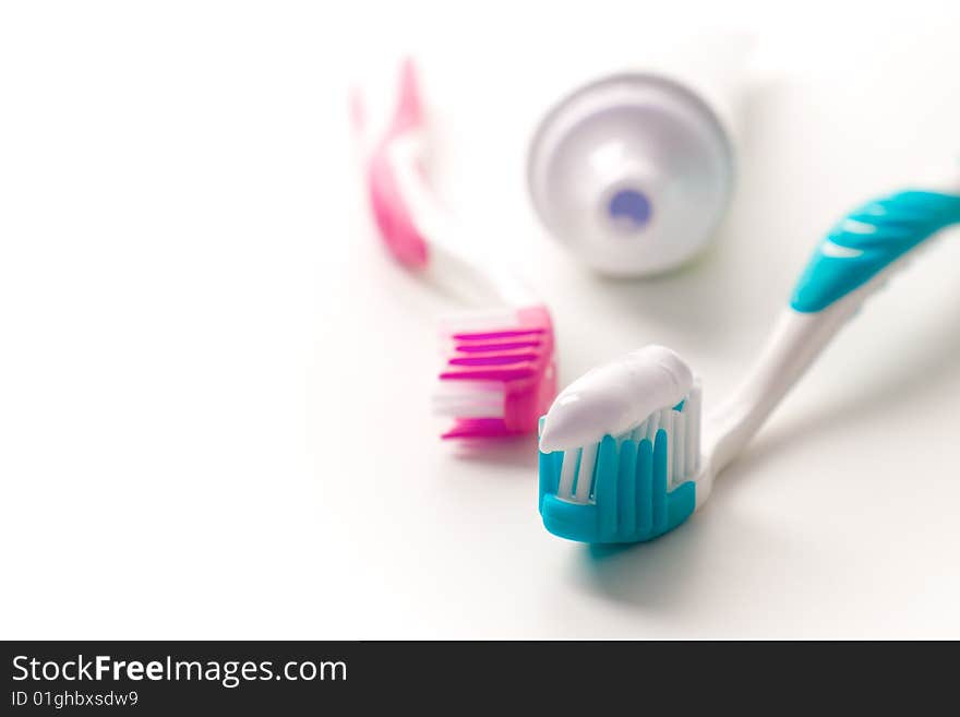 Toothpaste and toothbrushes closeup. dental care