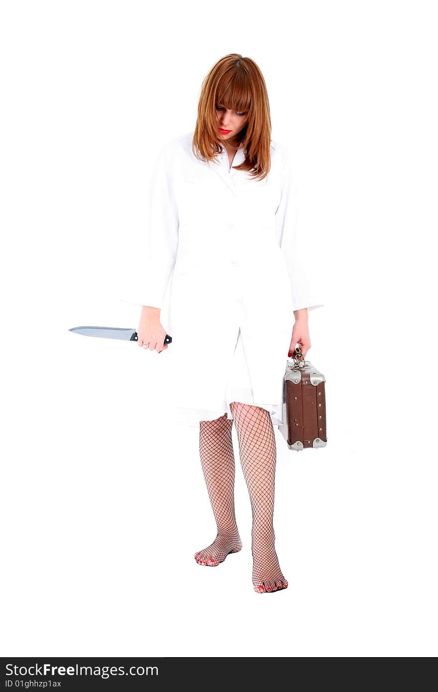 Woman with knife and suitcase isolated on white