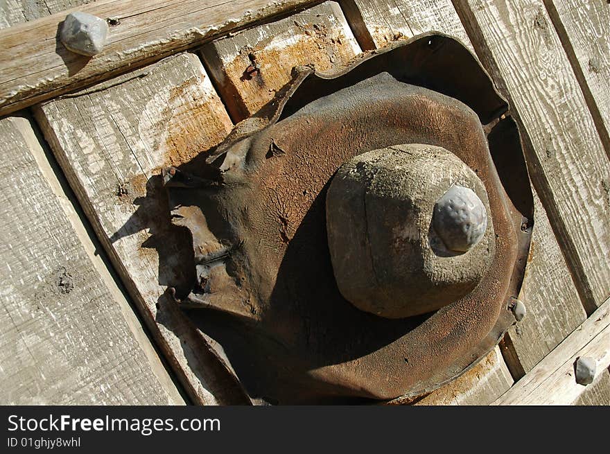 Close up of a wooden wheel of a wagon. Close up of a wooden wheel of a wagon