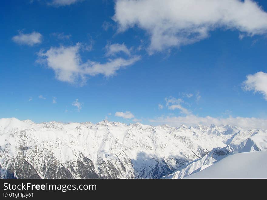 Beautiful view of winter mountain and blue sky. Beautiful view of winter mountain and blue sky