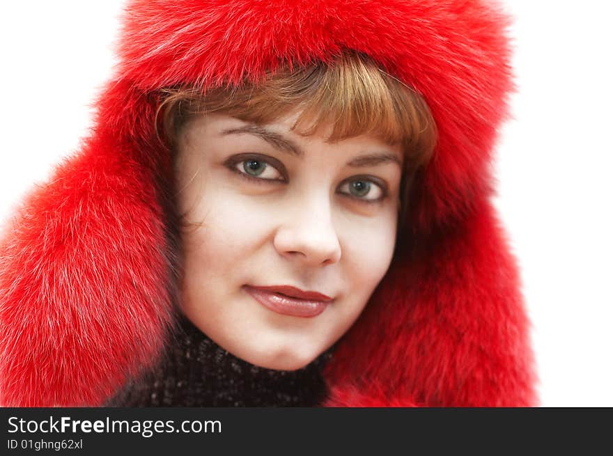 Young Attractive Woman In Red Fur-cap