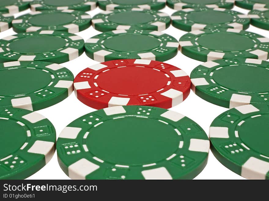 Green and one red poker chips isolated on white background