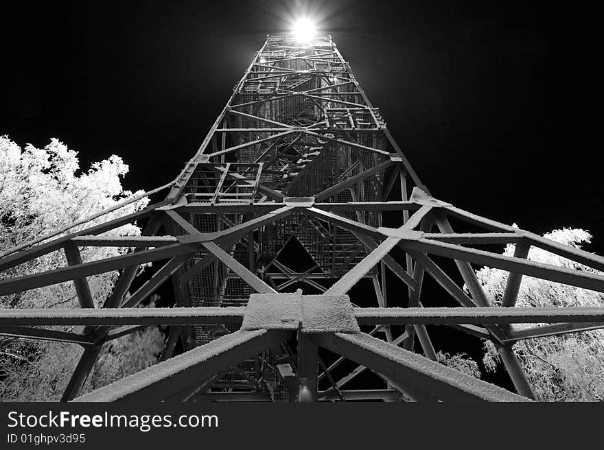 Frozen watchtower in cold winter night, lighthouse. Frozen watchtower in cold winter night, lighthouse