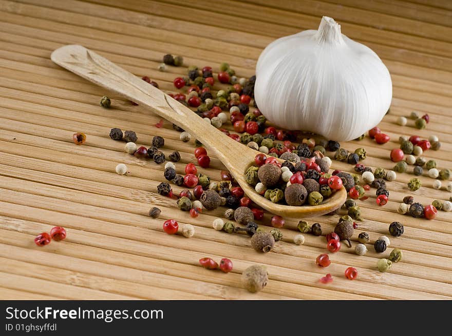 Spoon of aromatic peppers and garlic