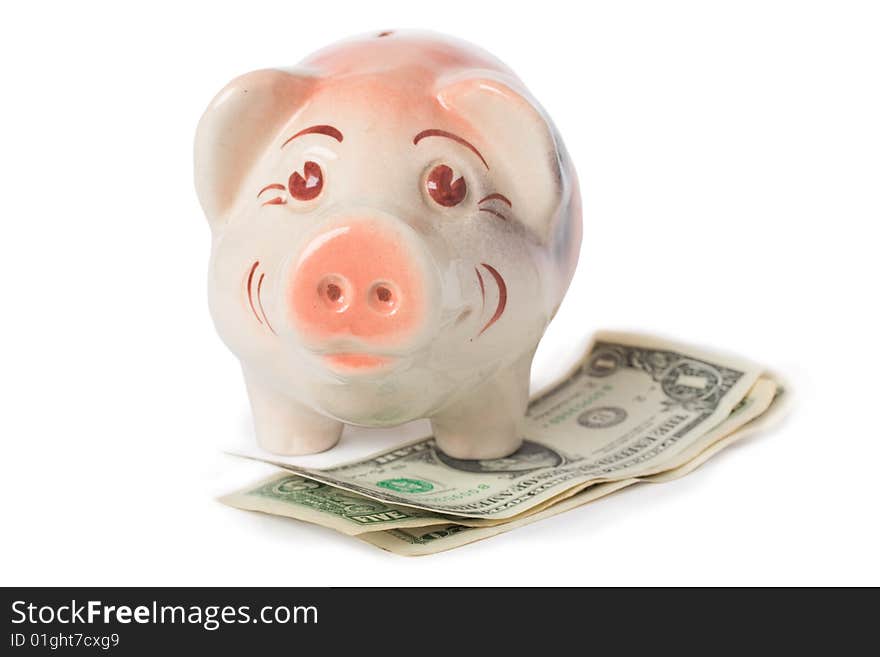 Happy piggy bank with cash isolated on white background