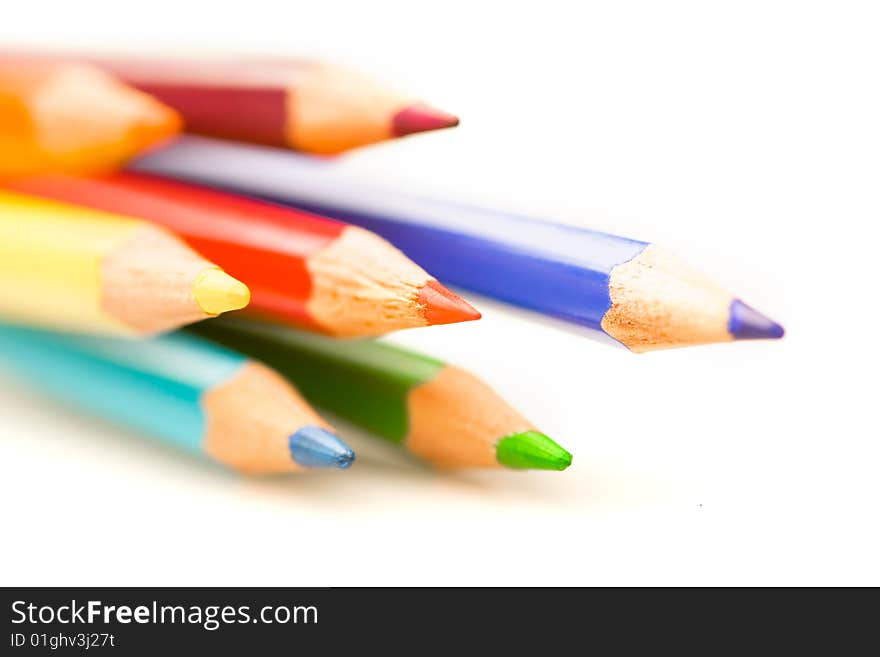 Coloured pencils isolated on white background