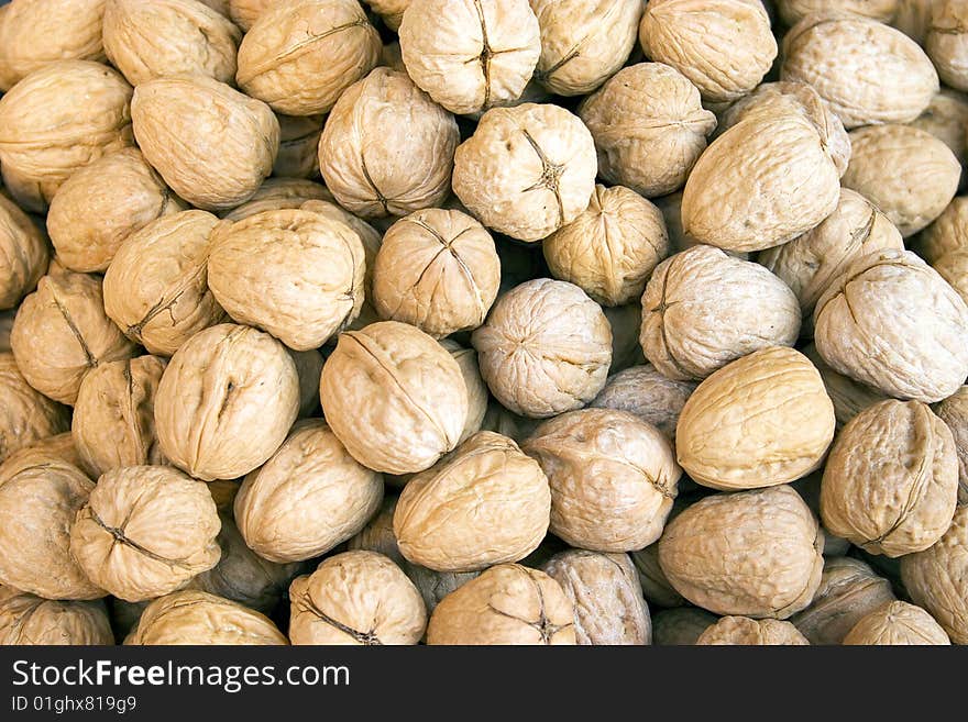 A lot of circassian walnuts with shell