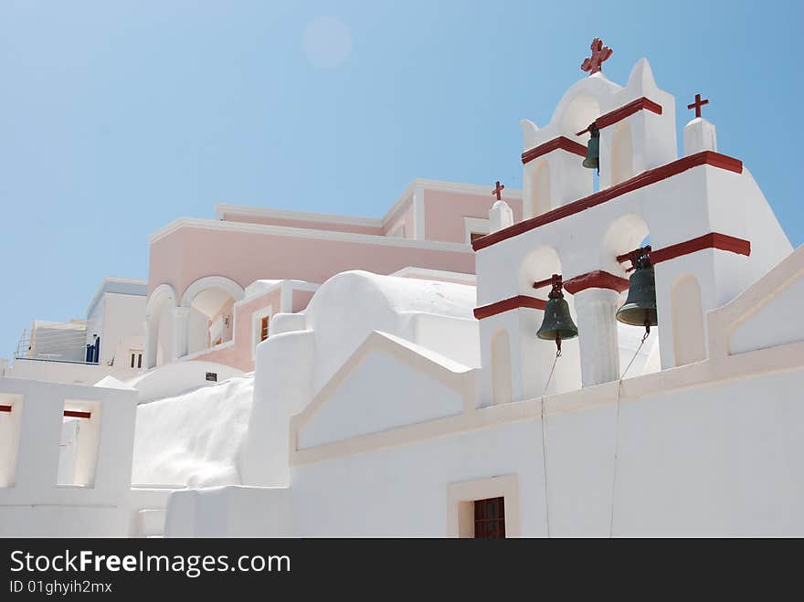 Oia on Santorini Island, Greece - blue sky, church