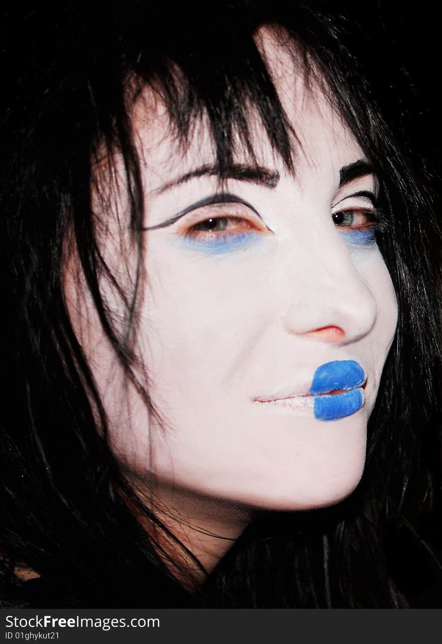 Cruel girl with blue lips