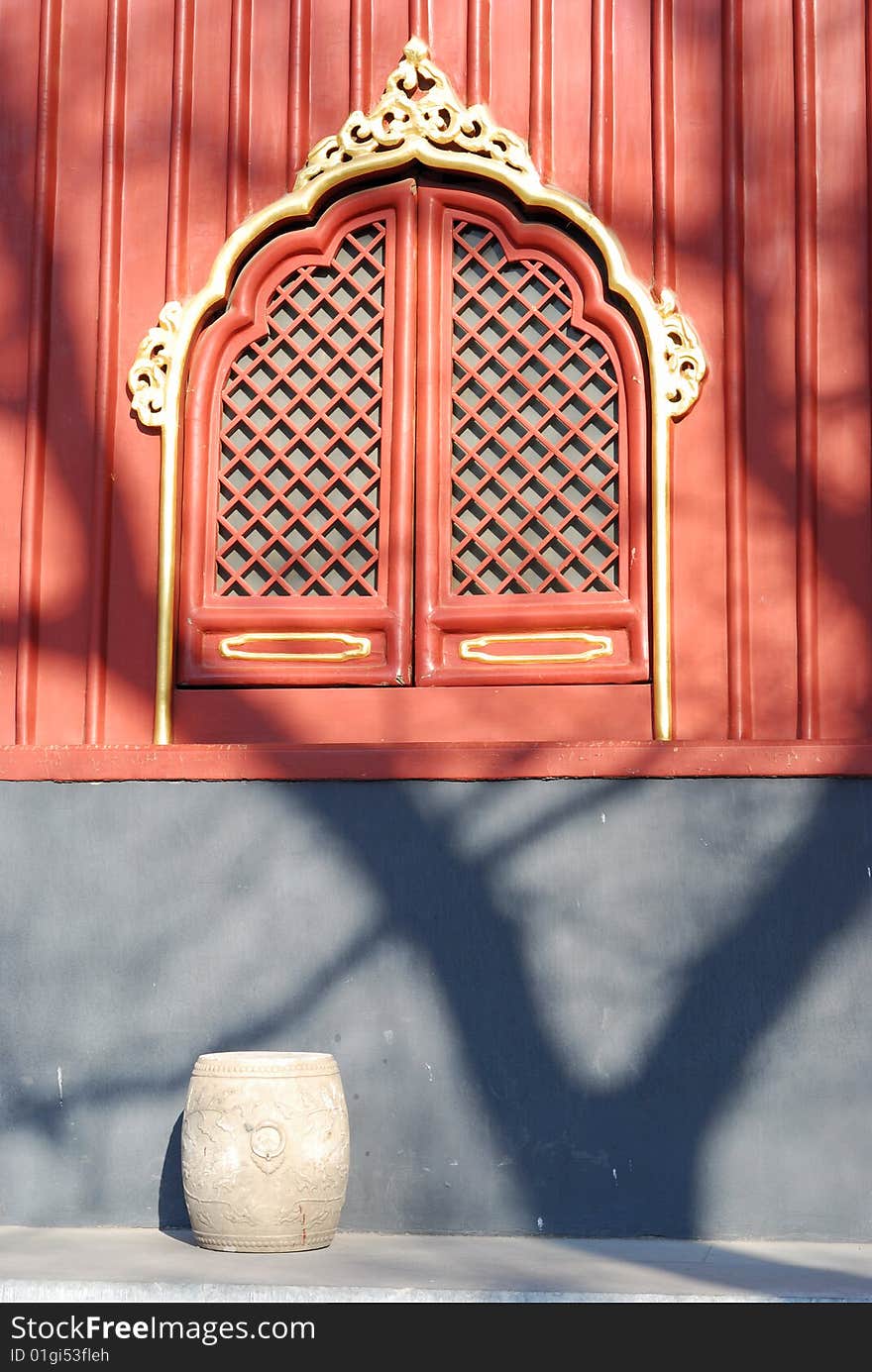 At the noon, a warm light from the sun was shining the window of YongHeGong (The Lama Temple). At the noon, a warm light from the sun was shining the window of YongHeGong (The Lama Temple).