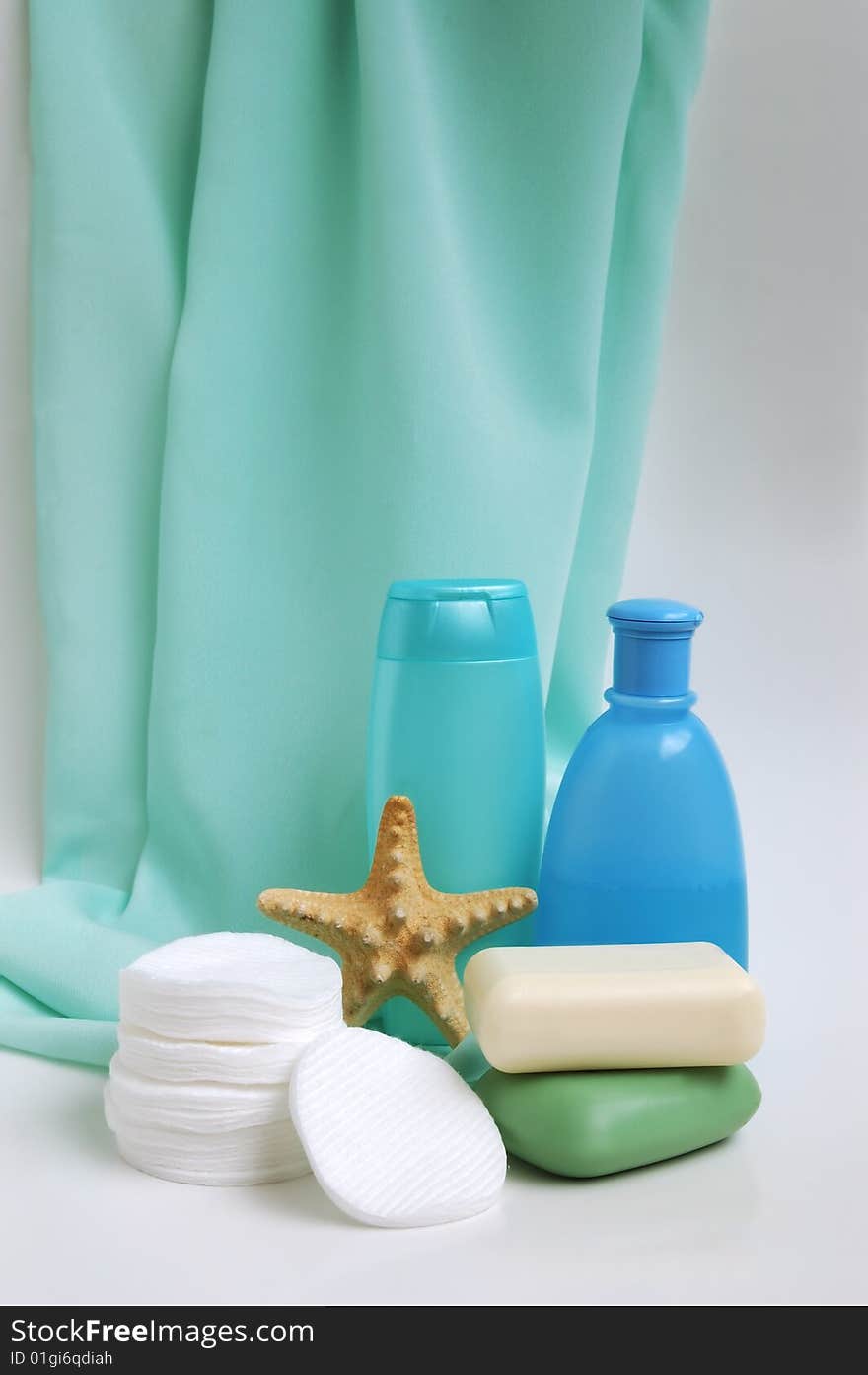 Household items for cleanliness on a satin background