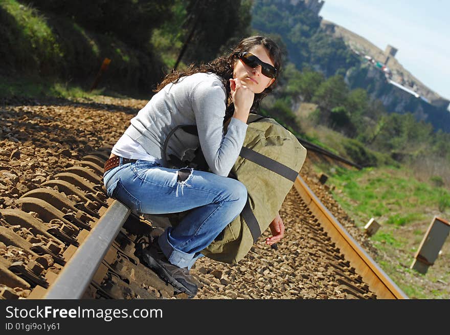 Sitting on a railway alone