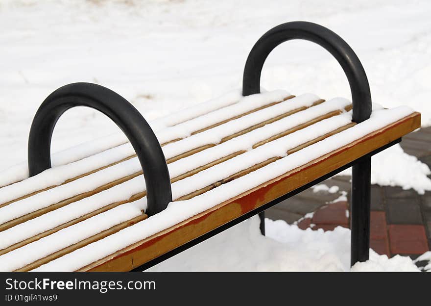 A Bench On The Snowfield