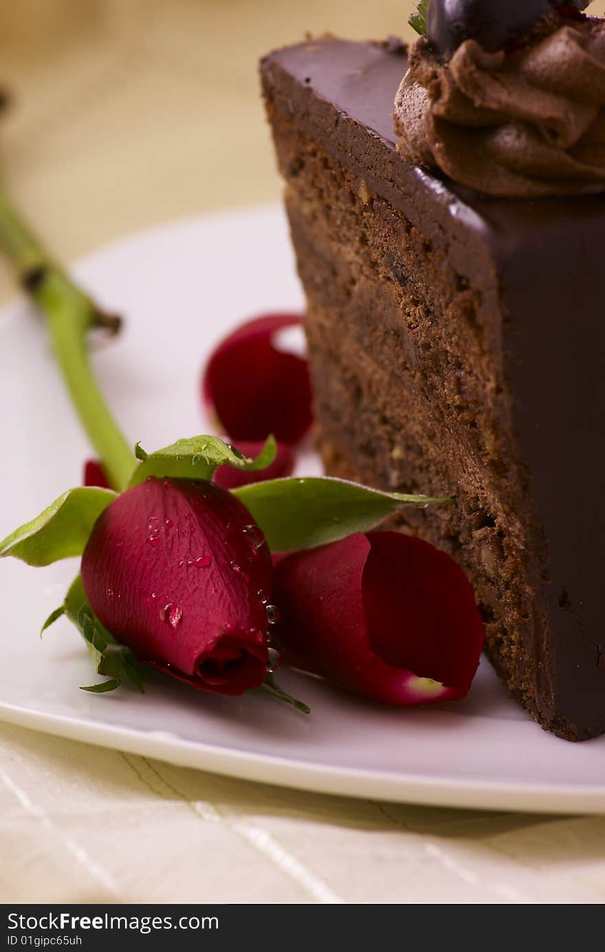 Chocolate cake with red rose