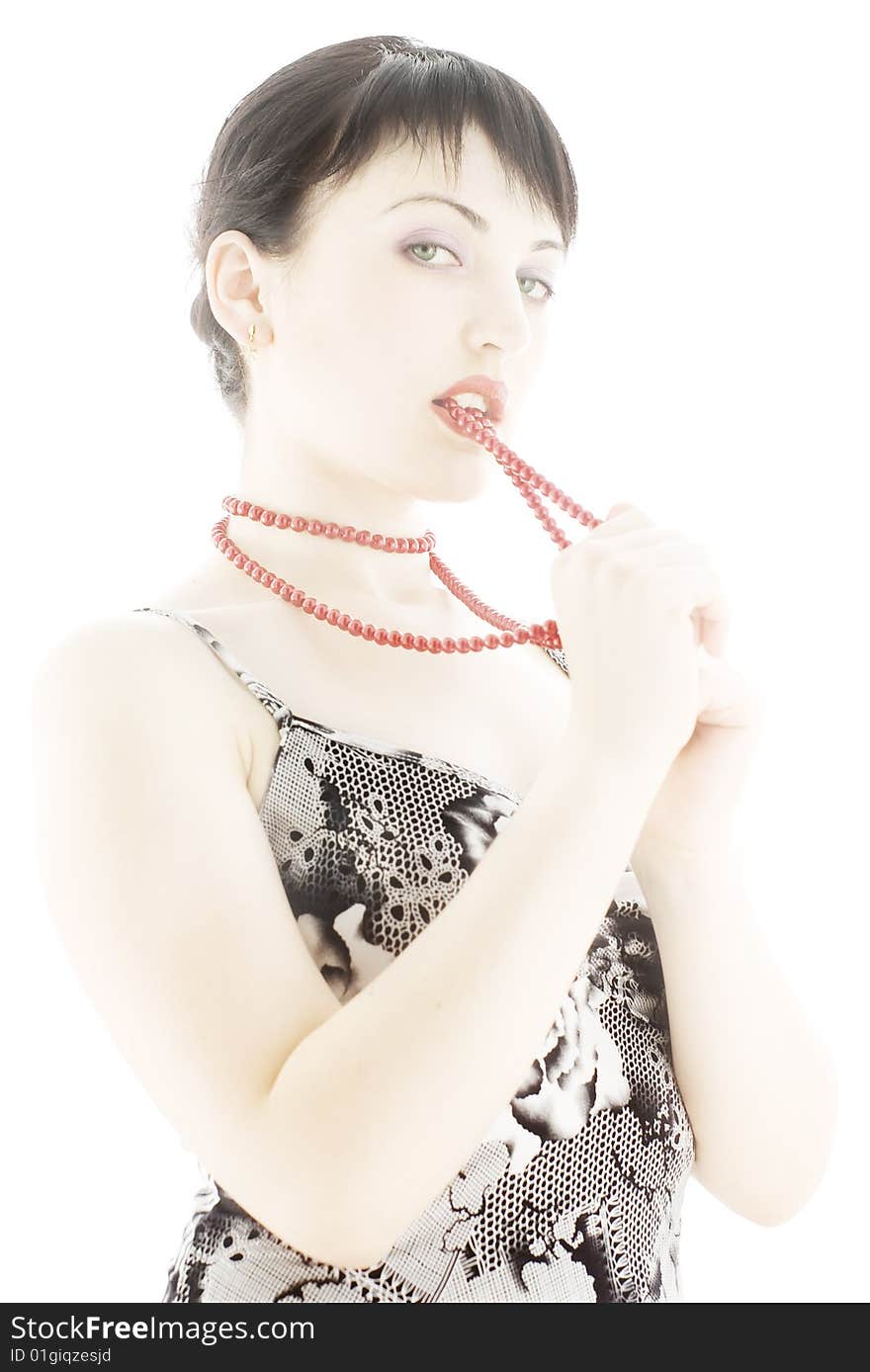 Attractive young girl with red necklace