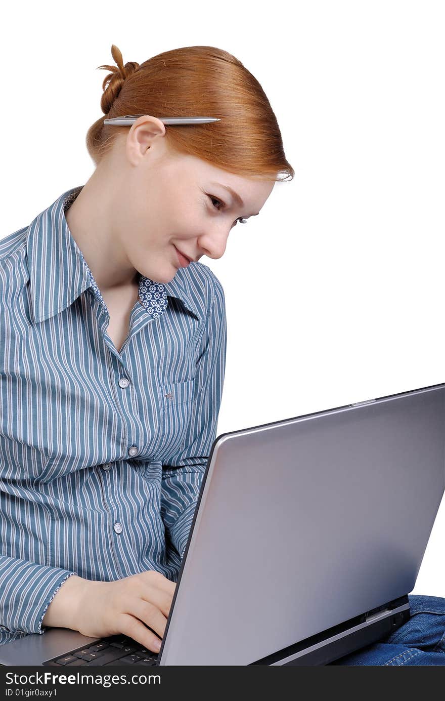 Young business woman with the laptop on a white background