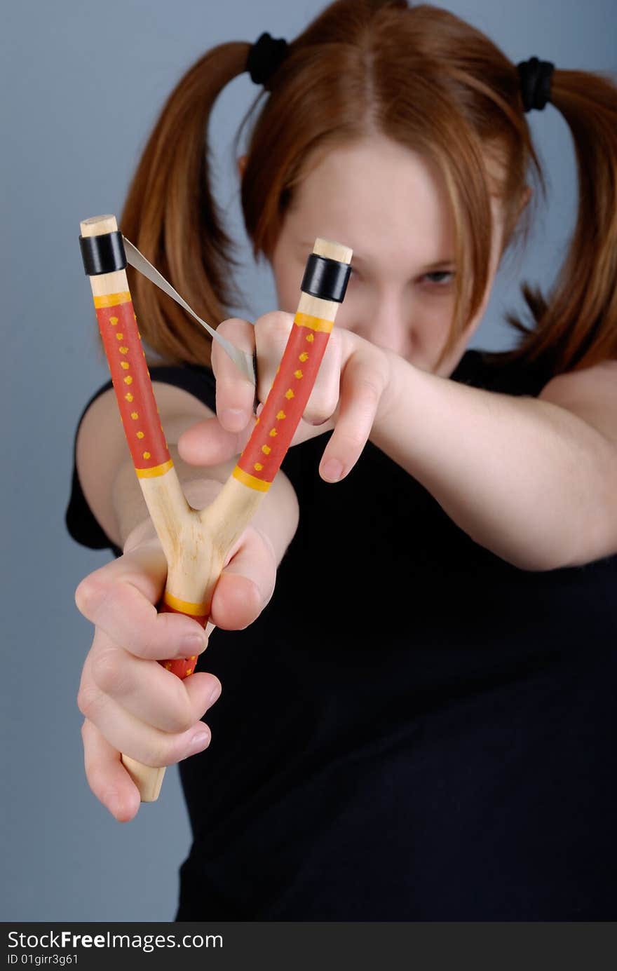 Portrait of a young beautiful woman with pigtail and tweaker. Portrait of a young beautiful woman with pigtail and tweaker