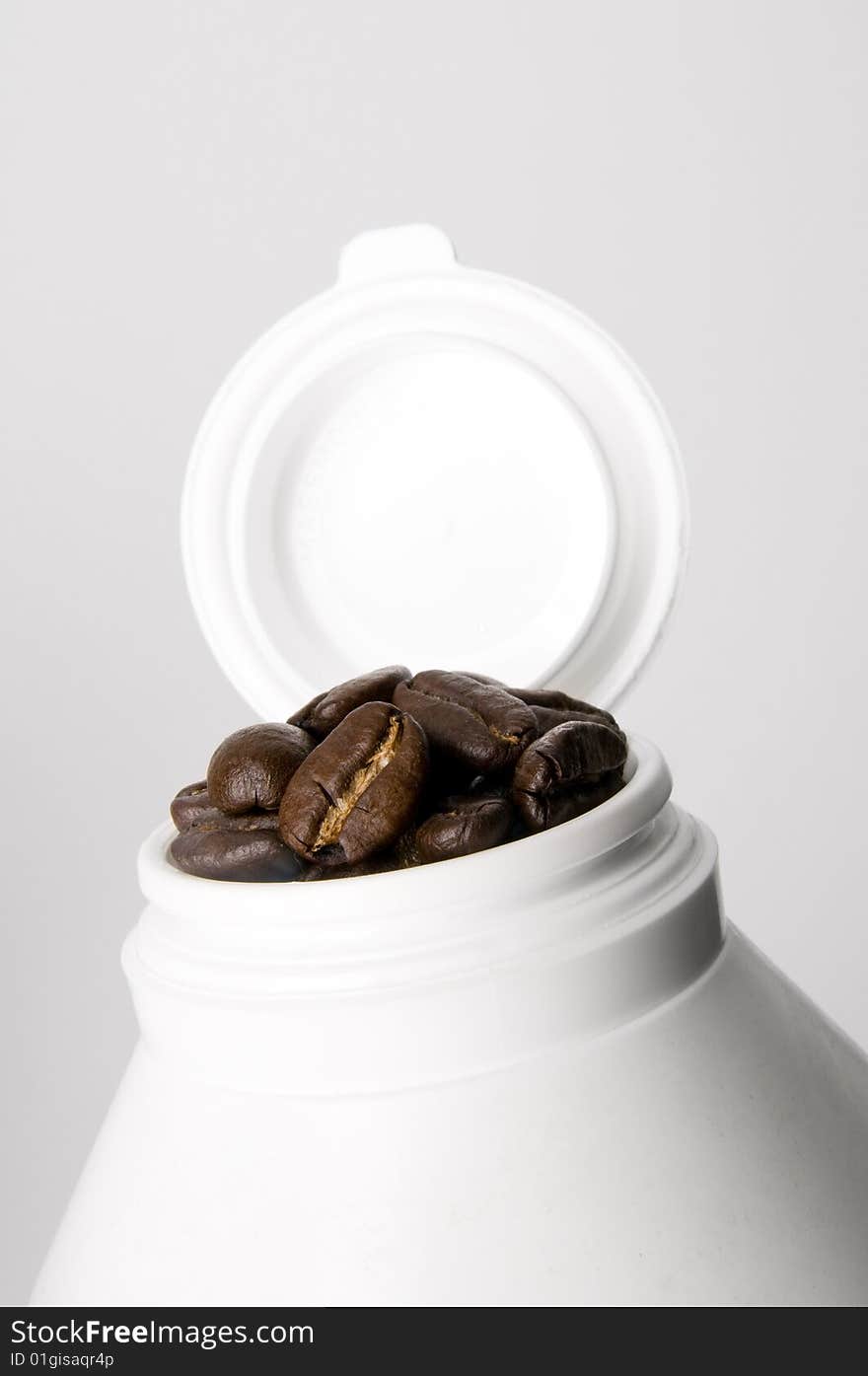 Medicine container with coffee beans