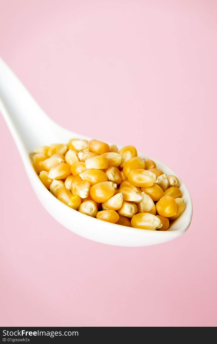 Image of popcorn with pink background